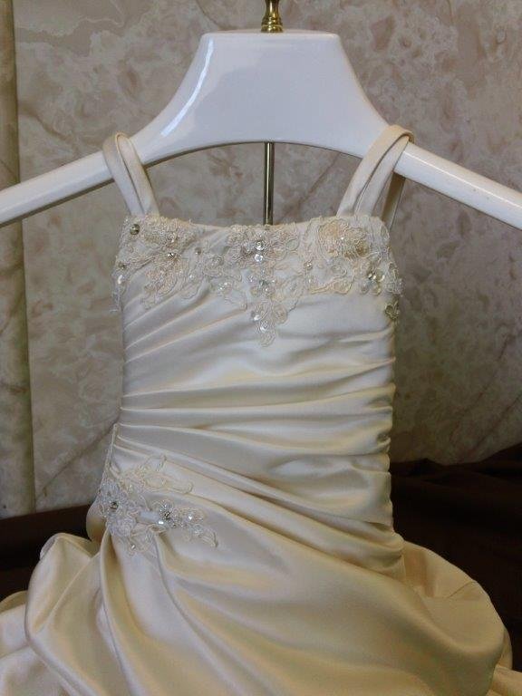 pleated infant wedding gown with cascading skirt